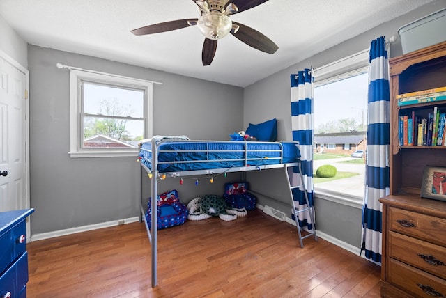 116 Dave Dr, Clarksville, TN 37042 - bedroom featuring baseboards, ceiling fan, and wood finished floors