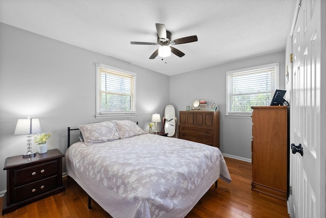 116 Dave Dr, Clarksville, TN 37042 - bedroom with baseboards, multiple windows, hardwood / wood-style floors, and ceiling fan