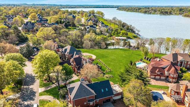 aerial view with a water view and a residential view