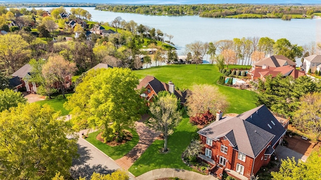 bird's eye view with a water view and a residential view