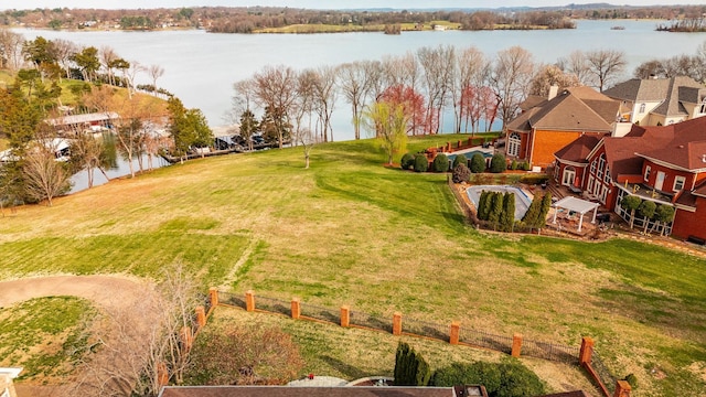 bird's eye view with a residential view and a water view