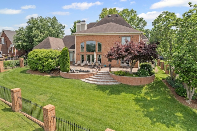 4157 Brandywine Pointe Blvd, Old Hickory, TN 37138 - back of house featuring a patio, a chimney, and brick siding