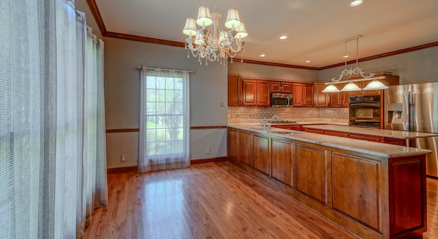 107 Geers Ct, Lebanon, TN 37087 - kitchen with crown molding, brown cabinetry, appliances with stainless steel finishes, wood finished floors, and backsplash
