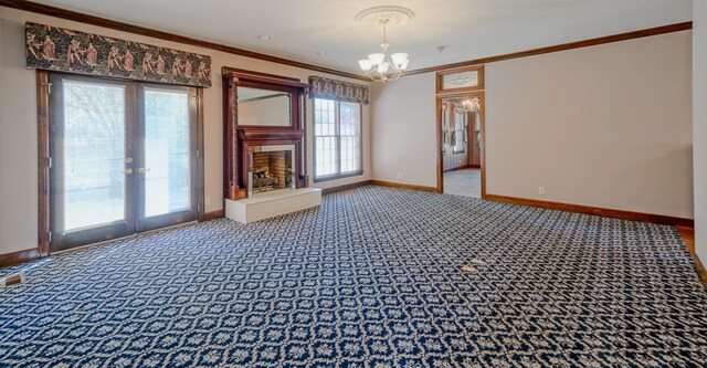 107 Geers Ct, Lebanon, TN 37087 - empty room featuring baseboards, an inviting chandelier, crown molding, and a healthy amount of sunlight