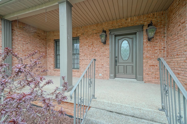 107 Geers Ct, Lebanon, TN 37087 - doorway to property featuring a porch and brick siding