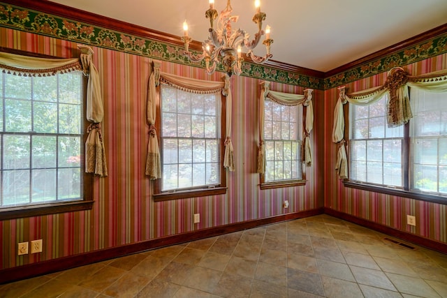 107 Geers Ct, Lebanon, TN 37087 - unfurnished dining area featuring crown molding, visible vents, baseboards, and a chandelier