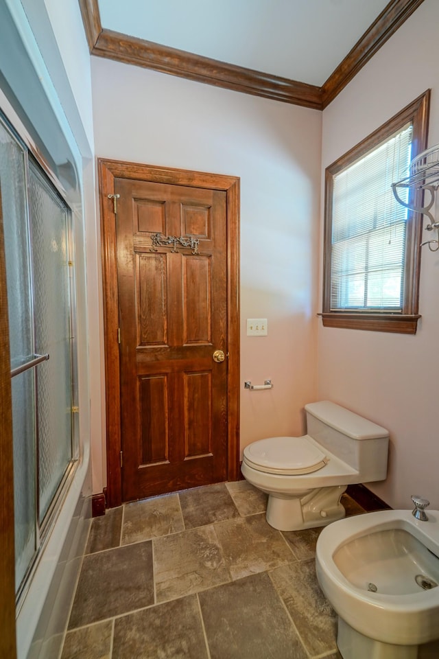 107 Geers Ct, Lebanon, TN 37087 - full bath featuring a bidet, shower / bath combination with glass door, ornamental molding, toilet, and stone finish floor