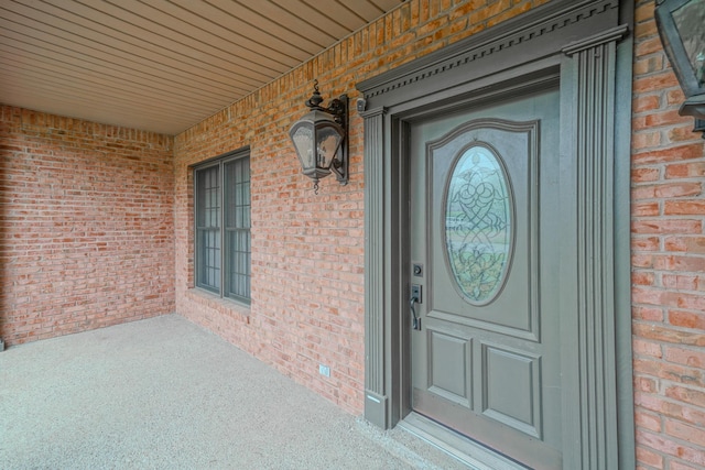 107 Geers Ct, Lebanon, TN 37087 - doorway to property featuring covered porch and brick siding
