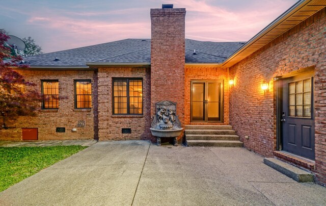 107 Geers Ct, Lebanon, TN 37087 - back of house featuring entry steps, a chimney, a patio, and roof with shingles