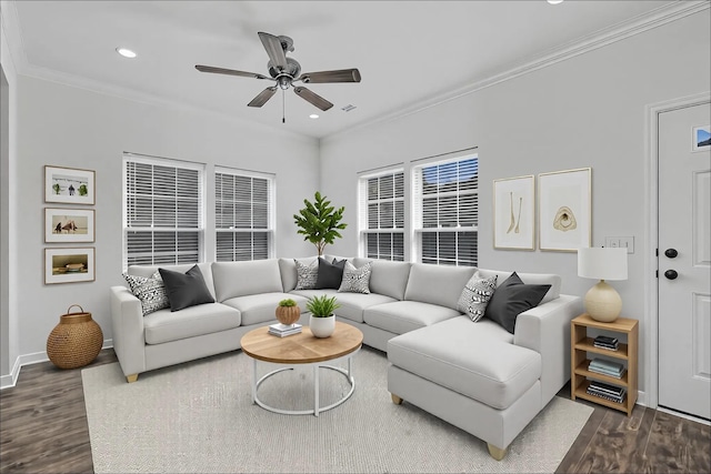 living area with crown molding, ceiling fan, and dark wood finished floors