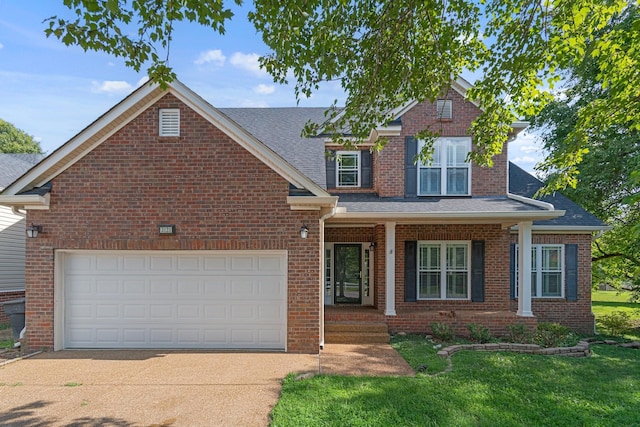 3121 Traviston Dr, Franklin, TN 37064 - traditional-style home featuring a shingled roof, concrete driveway, a front yard, and brick siding
