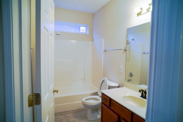 full bath featuring washtub / shower combination, toilet, vanity, and tile patterned flooring