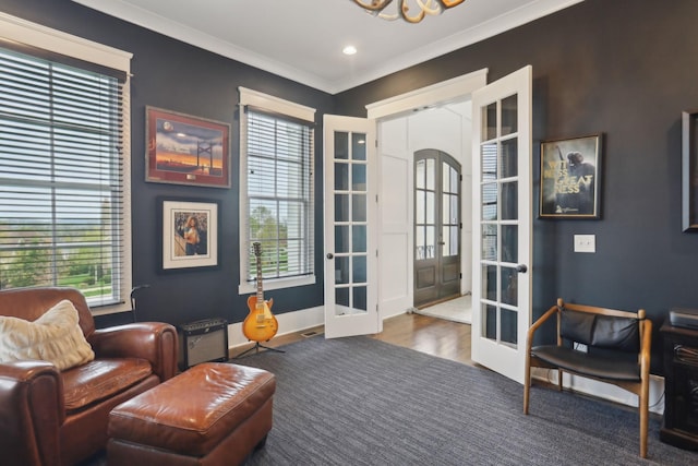 1406 Newhaven Dr, Brentwood, TN 37027 - sitting room with an inviting chandelier, french doors, crown molding, and a healthy amount of sunlight