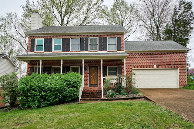 view of front of house featuring brick siding, a chimney, a porch, and concrete driveway