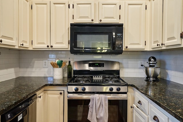 kitchen featuring white cabinets, dark stone countertops, decorative backsplash, and black appliances