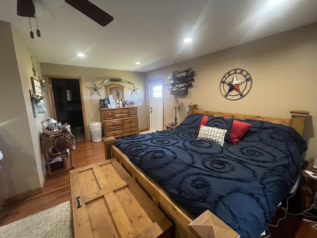 bedroom featuring wood finished floors, ceiling fan, and recessed lighting