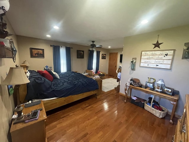 bedroom featuring recessed lighting, wood finished floors, and a ceiling fan