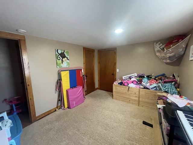 bedroom featuring light carpet