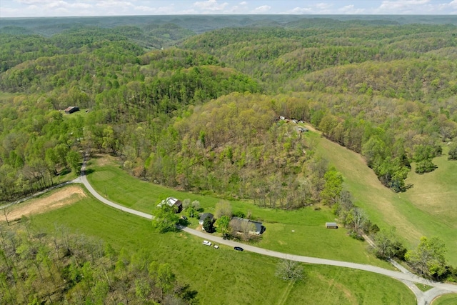 bird's eye view featuring a forest view
