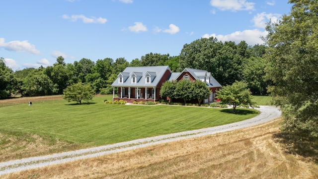 view of front of property featuring a porch and a front lawn