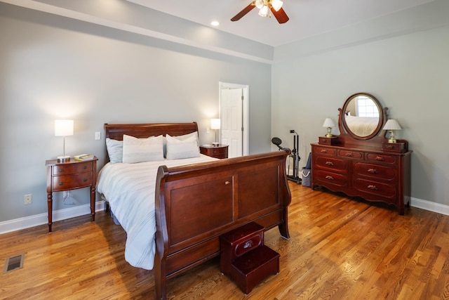 bedroom with baseboards, recessed lighting, a ceiling fan, visible vents, and light wood finished floors