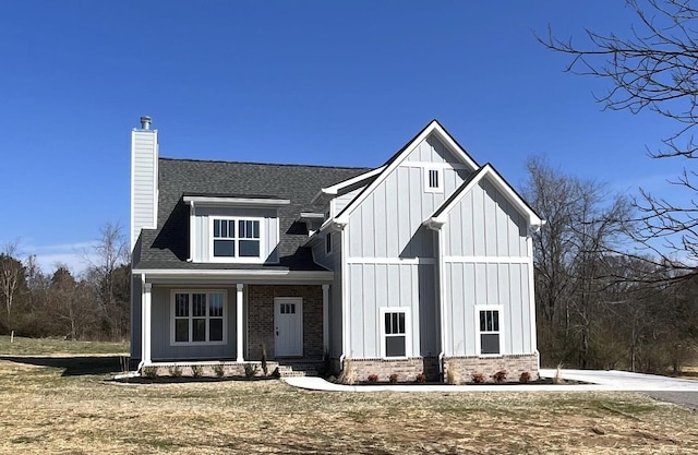 19 Faith Ln, Lebanon, TN 37087 - view of front of home with a chimney, board and batten siding, and a shingled roof