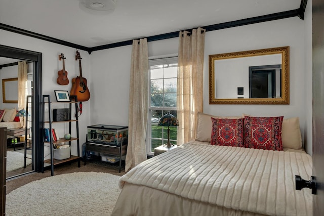 carpeted bedroom with crown molding