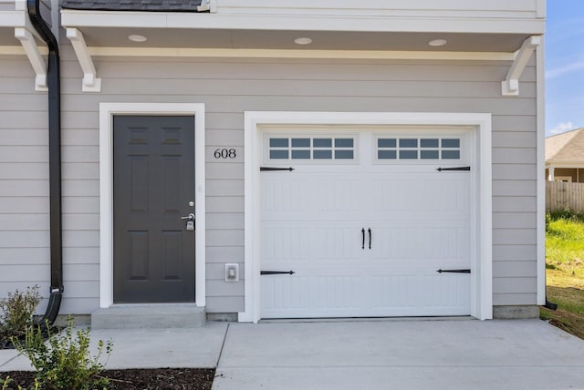 garage featuring driveway