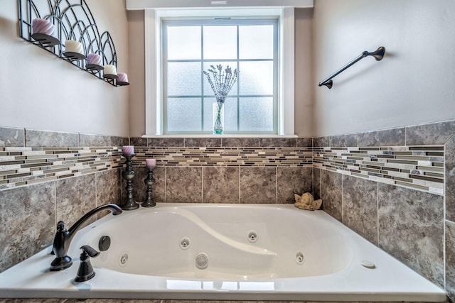 full bath with a jetted tub