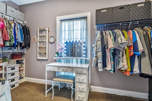 spacious closet with carpet floors