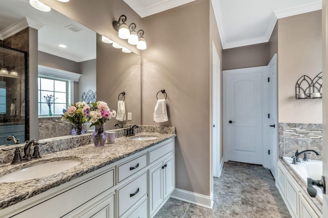 full bath featuring a sink, a shower stall, and crown molding