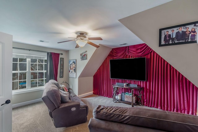 carpeted living room with visible vents, baseboards, and ceiling fan