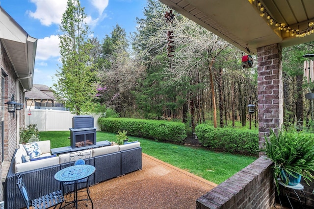 view of patio / terrace with fence and an outdoor hangout area