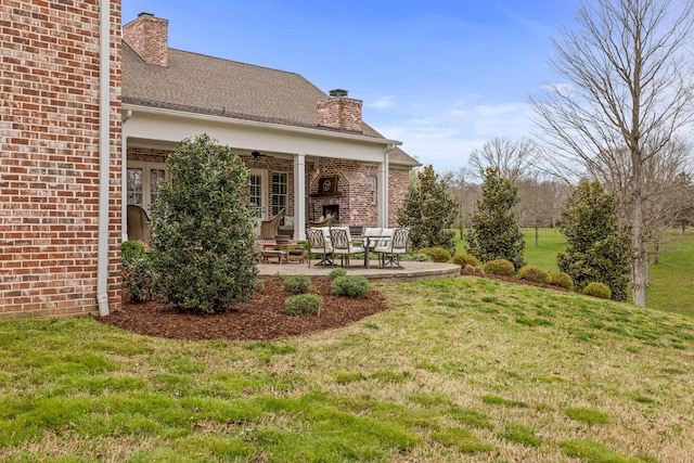 620 Williamson County Line Rd, Fairview, TN 37062 - view of yard featuring a patio, a ceiling fan, and an outdoor brick fireplace