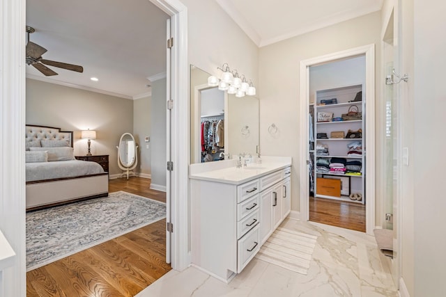 620 Williamson County Line Rd, Fairview, TN 37062 - full bath with ensuite bathroom, a ceiling fan, crown molding, vanity, and marble finish floor