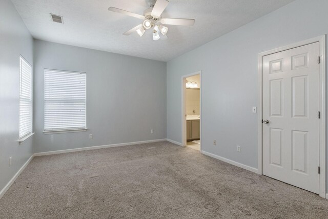 1007 Whitley Pl, Hendersonville, TN 37075 - unfurnished bedroom with ensuite bathroom, a ceiling fan, visible vents, light carpet, and baseboards