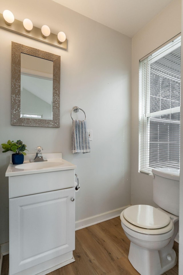1007 Whitley Pl, Hendersonville, TN 37075 - bathroom featuring toilet, vanity, wood finished floors, and baseboards