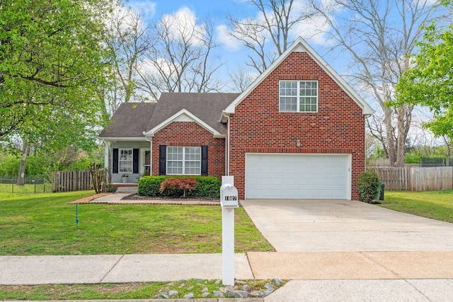1007 Whitley Pl, Hendersonville, TN 37075 - traditional-style home featuring a garage, fence, a front lawn, brick siding, and concrete driveway