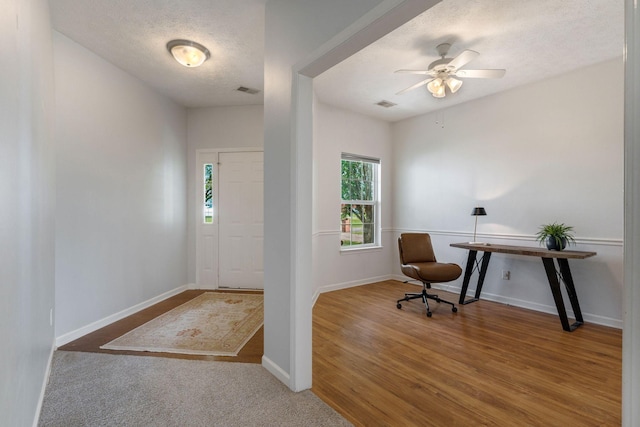 1007 Whitley Pl, Hendersonville, TN 37075 - entryway with baseboards, a textured ceiling, visible vents, ceiling fan, and wood finished floors