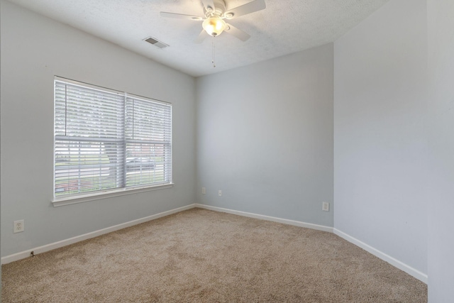 1007 Whitley Pl, Hendersonville, TN 37075 - carpeted empty room featuring visible vents, ceiling fan, baseboards, and a textured ceiling