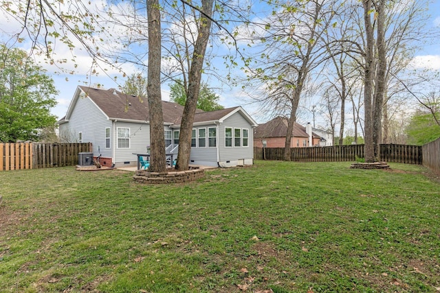 1007 Whitley Pl, Hendersonville, TN 37075 - rear view of house with crawl space, central air condition unit, a fenced backyard, and a lawn