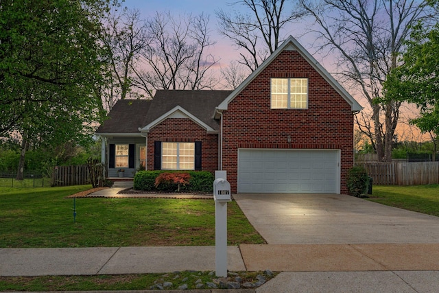 1007 Whitley Pl, Hendersonville, TN 37075 - traditional home with driveway, a front lawn, fence, and a garage