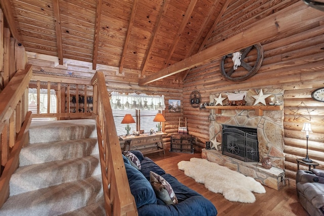 170 N Leath Rd, Portland, TN 37148 - living room featuring wood ceiling, a stone fireplace, wood finished floors, and beam ceiling