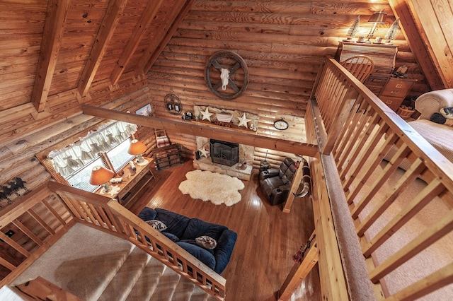 170 N Leath Rd, Portland, TN 37148 - living area featuring wood ceiling, log walls, wood finished floors, and beamed ceiling