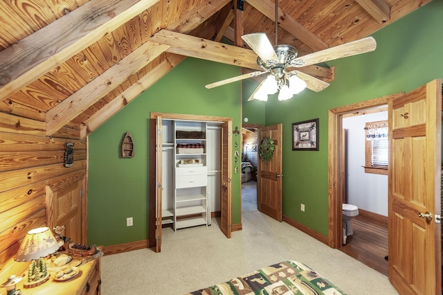 170 N Leath Rd, Portland, TN 37148 - bedroom featuring vaulted ceiling with beams, wooden ceiling, a closet, and carpet flooring