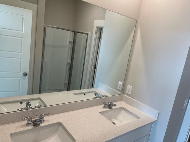 341 Casper Dr, Spring Hill, TN 37174 - full bath with a shower stall, double vanity, and a sink
