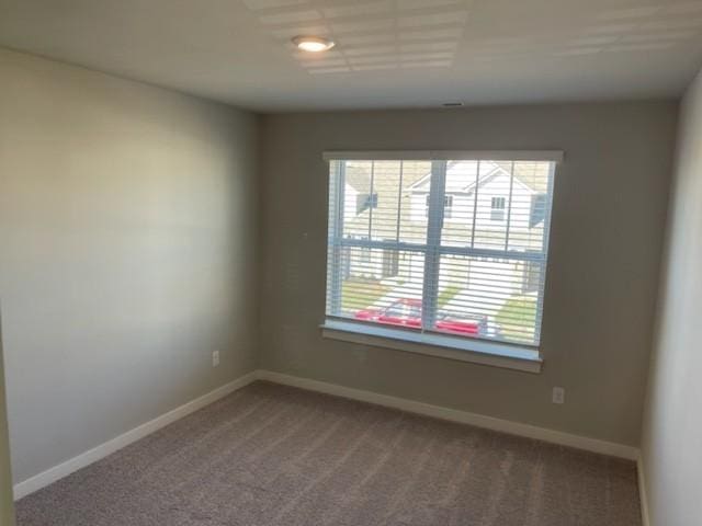 341 Casper Dr, Spring Hill, TN 37174 - carpeted empty room with baseboards
