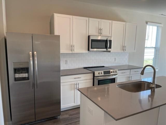 341 Casper Dr, Spring Hill, TN 37174 - kitchen featuring stainless steel appliances, white cabinets, and a sink