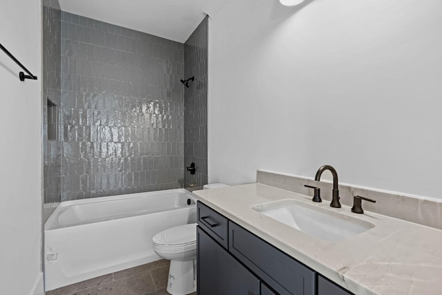 bathroom featuring toilet, vanity, and shower / bathtub combination