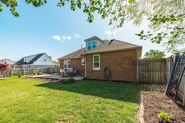 2403 English Hill Dr, Murfreesboro, TN 37130 - back of house with a patio, brick siding, a fenced backyard, and a yard